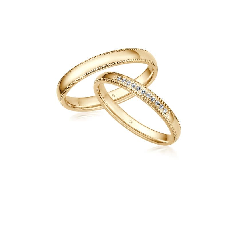Trauringpaar in Gelbgold mit Design