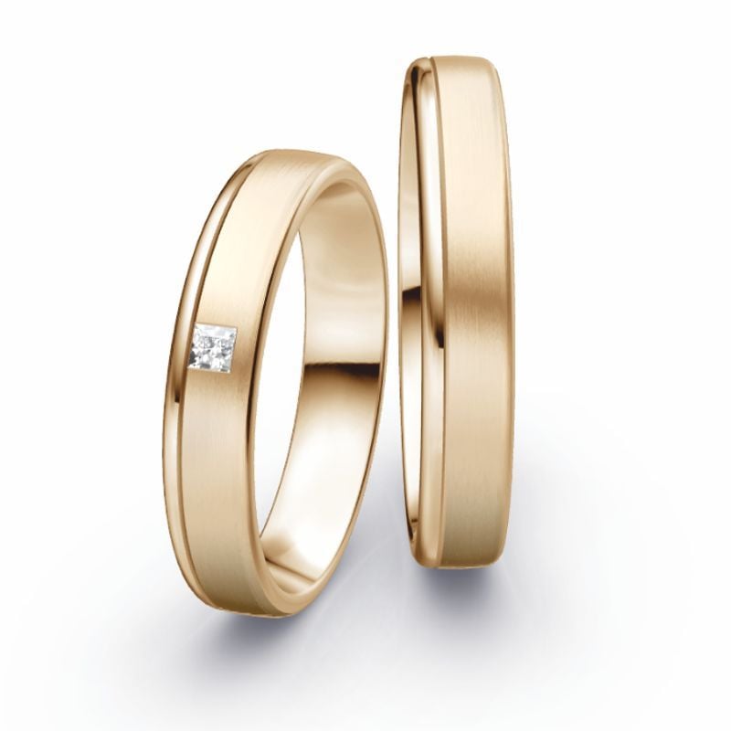 Juwelier Knappe Trauringe in Spannringoptik Gelbgold mit Brillant